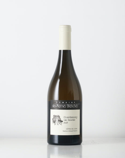 Natural wine from Marnes Blanches in Jura. This Chardonnay is made from 60 years old vines, nothing added.